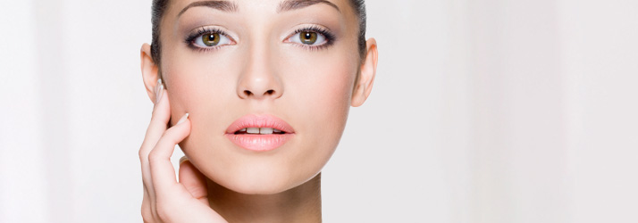Woman receiving a rejuvenating facial treatment at a med spa