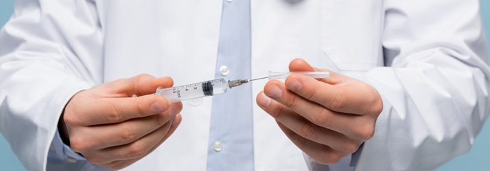 vitamin injection being prepared by a provider